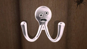 Och the grumpy towel hook sits on the back of the bathroom door ready to agitate anyone who wakes him.